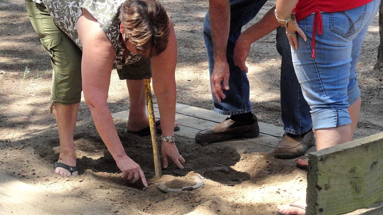 People Measuring Horseshoe landing